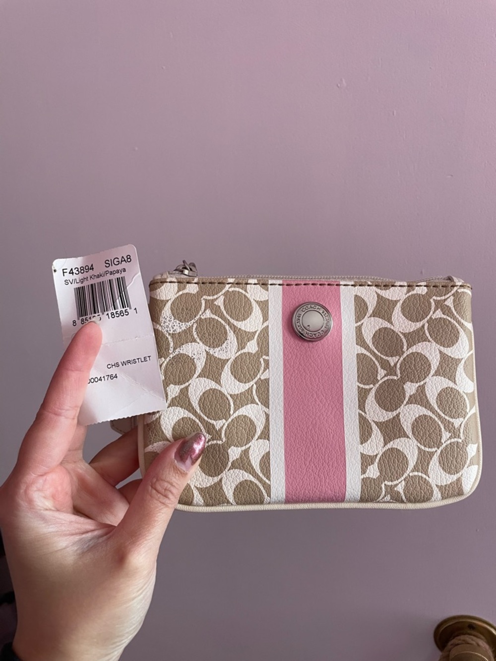 Tan and Pink Coach Wristlet